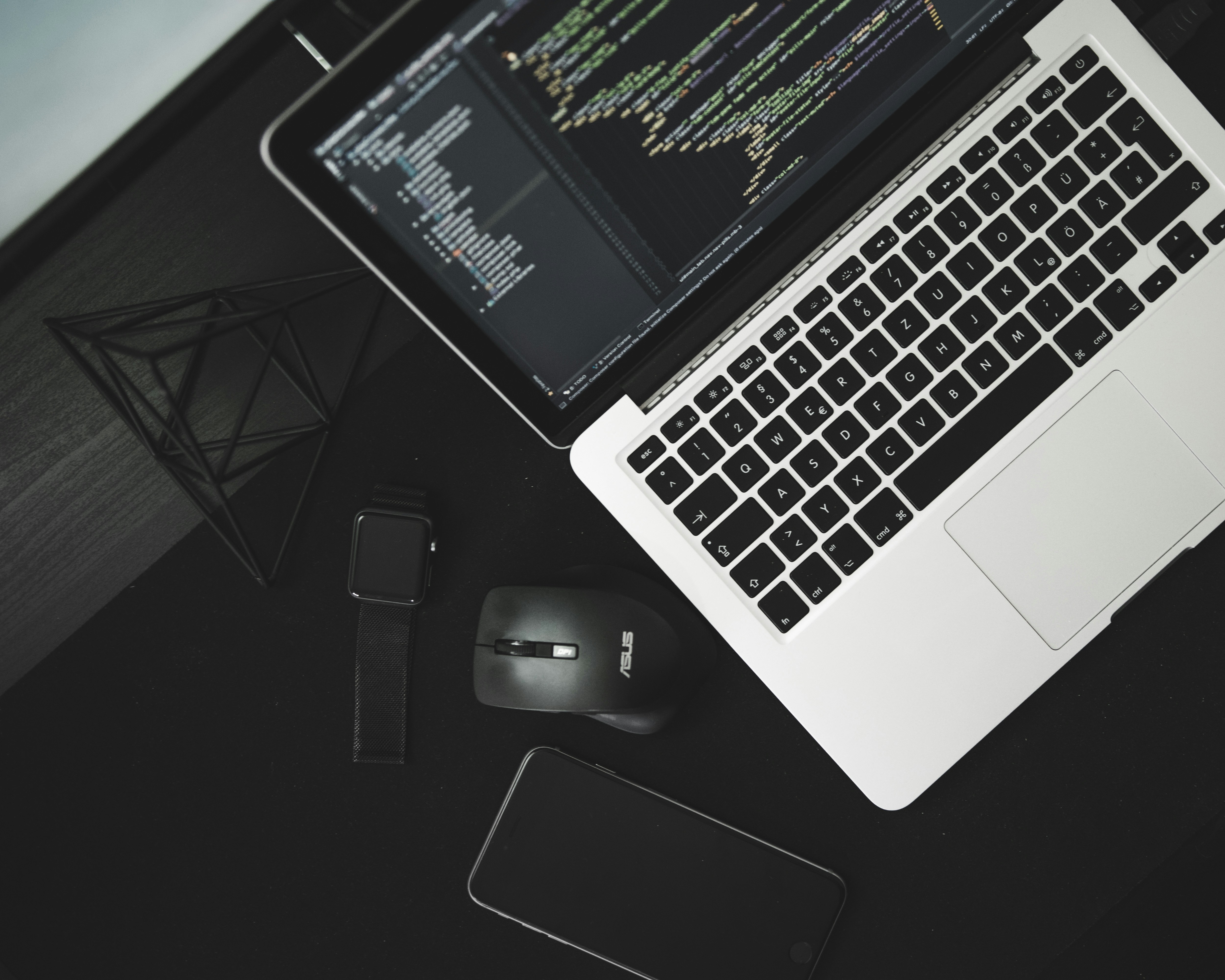 Developer coding on laptop